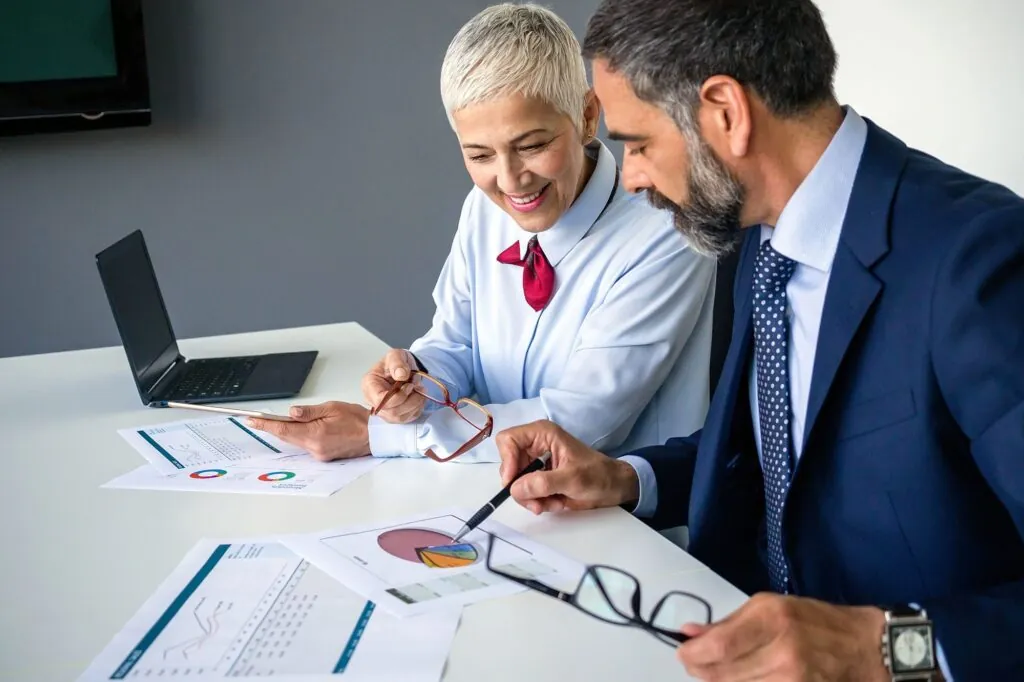 Advisers reviewing a business sale